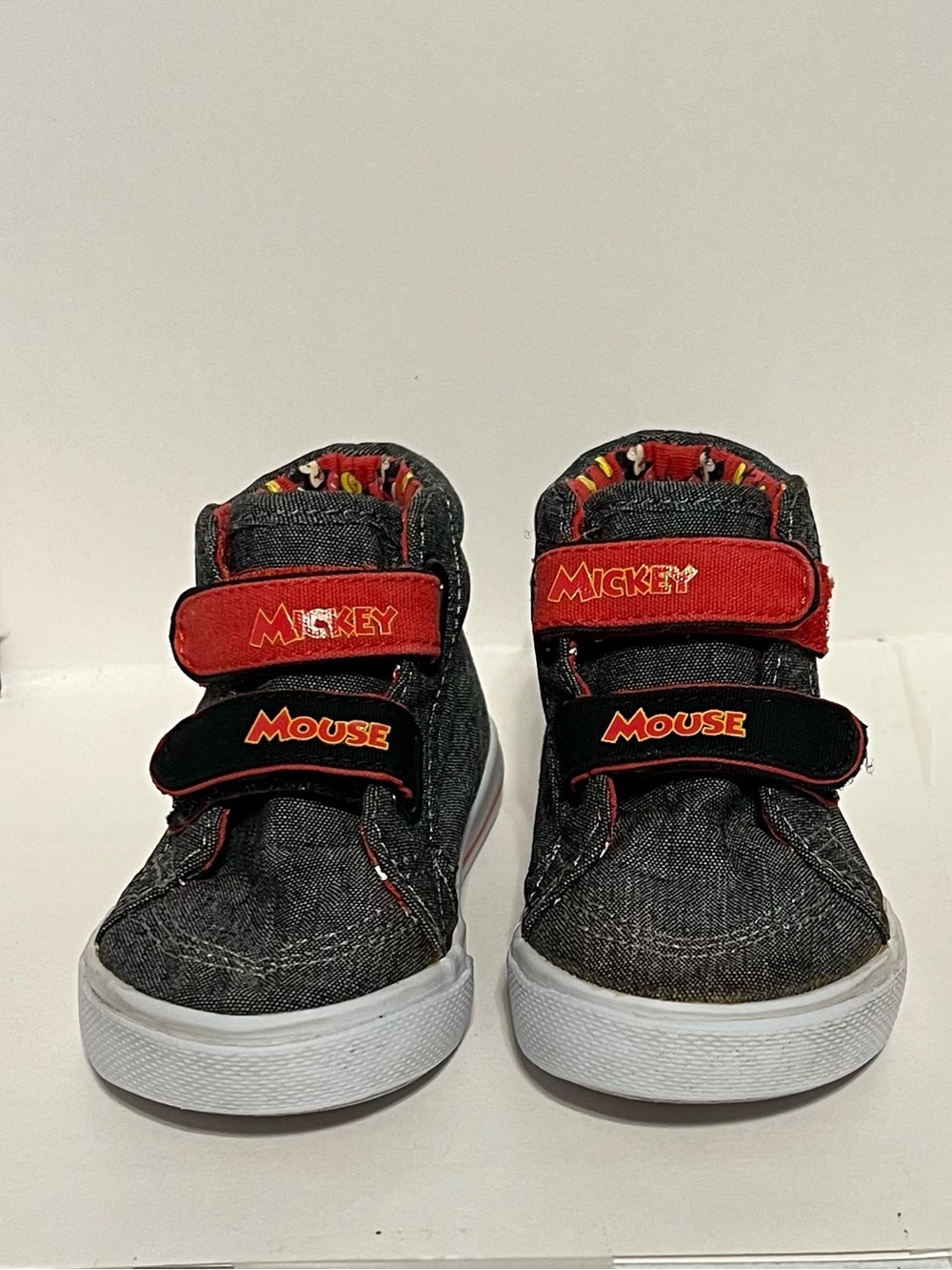 Disney Black Denim High-Top Sneakers with Red and Yellow Accents